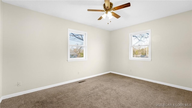 462 Lakeview Dr, Camdenton, MO 65020 - carpeted spare room featuring healthy amount of natural light and a ceiling fan