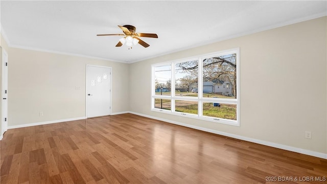 462 Lakeview Dr, Camdenton, MO 65020 - unfurnished room featuring a ceiling fan, light wood-type flooring, and crown molding