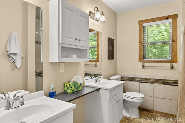 28 Hamilton Way, Sunrise Beach, MO 65079 - full bath with vanity, tile walls, and a wainscoted wall