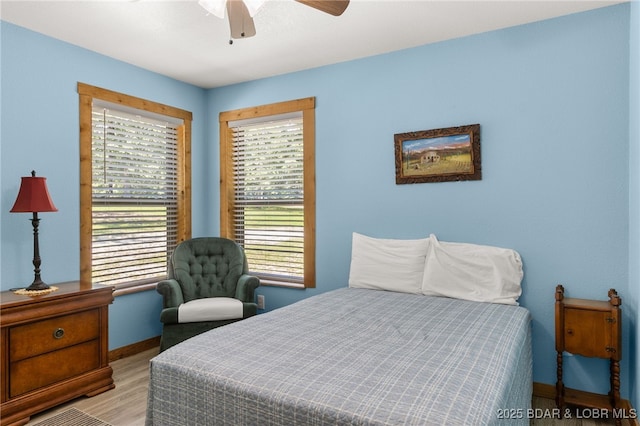 28 Hamilton Way, Sunrise Beach, MO 65079 - bedroom with wood finished floors and a ceiling fan