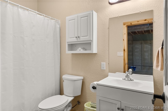 28 Hamilton Way, Sunrise Beach, MO 65079 - bathroom with vanity, a textured wall, and curtained shower