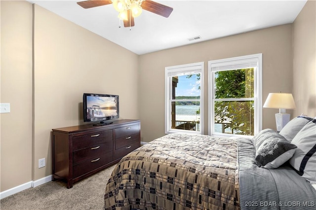 164 Get A Way Ln, Camdenton, MO 65020 - bedroom featuring light carpet and ceiling fan