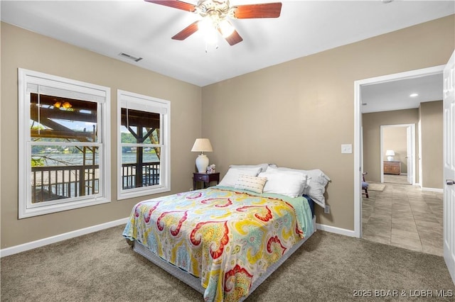 164 Get A Way Ln, Camdenton, MO 65020 - carpeted bedroom with baseboards and a ceiling fan