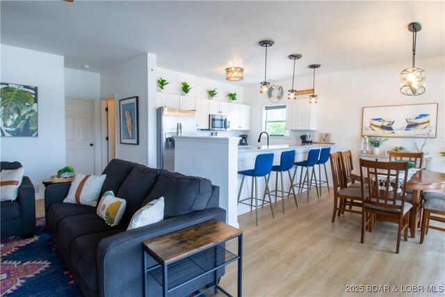 418 Regatta Bay Dr Unit 4A, Lake Ozark, MO 65049 - living area with light wood-type flooring