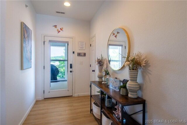 418 Regatta Bay Dr Unit 4A, Lake Ozark, MO 65049 - doorway to outside with light wood-style flooring and recessed lighting