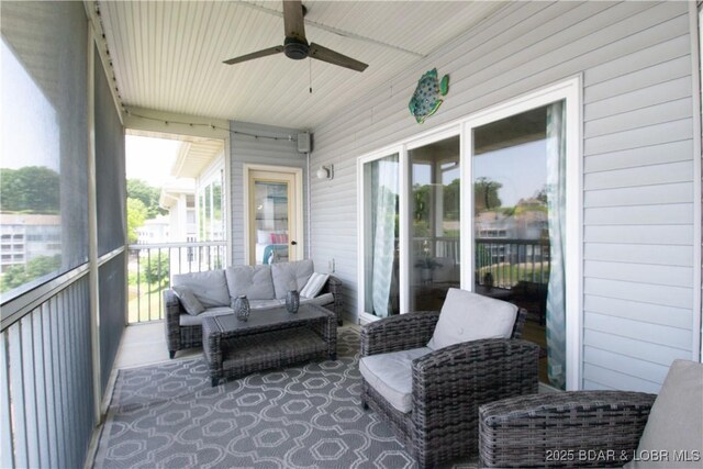 418 Regatta Bay Dr Unit 4A, Lake Ozark, MO 65049 - sunroom featuring ceiling fan and an outdoor hangout area