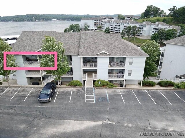 418 Regatta Bay Dr Unit 4A, Lake Ozark, MO 65049 - view of property with uncovered parking