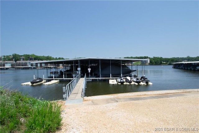 418 Regatta Bay Dr Unit 4A, Lake Ozark, MO 65049 - dock with boat lift and a water view