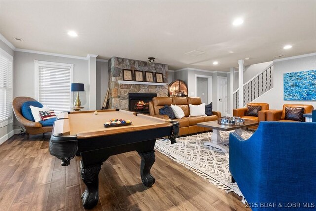 7 Lost Spike Ct, Camdenton, MO 65020 - recreation room with ornamental molding, wood finished floors, recessed lighting, billiards table, and a fireplace
