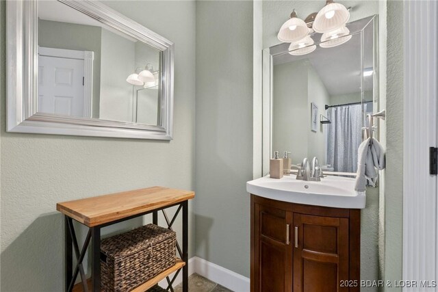 7 Lost Spike Ct, Camdenton, MO 65020 - full bathroom with vanity and baseboards