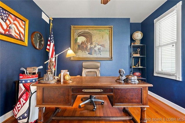 7 Lost Spike Ct, Camdenton, MO 65020 - home office featuring wood finished floors and plenty of natural light