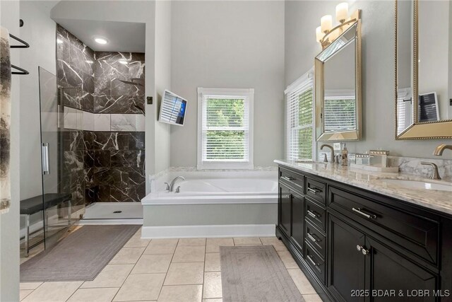 7 Lost Spike Ct, Camdenton, MO 65020 - full bathroom featuring a garden tub, double vanity, a marble finish shower, tile patterned floors, and a towering ceiling