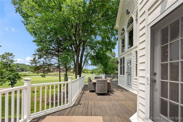 7 Lost Spike Ct, Camdenton, MO 65020 - wooden terrace with outdoor dining space, view of golf course, and a yard