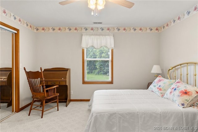2326 Willow Creek Rd, Camdenton, MO 65020 - carpeted bedroom featuring a ceiling fan and a closet