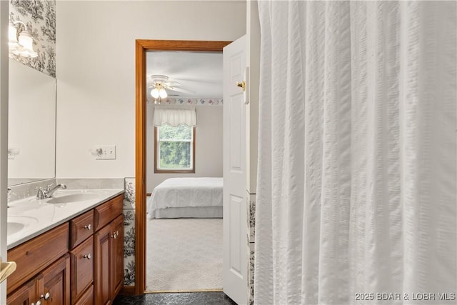 2326 Willow Creek Rd, Camdenton, MO 65020 - ensuite bathroom featuring double vanity and a ceiling fan