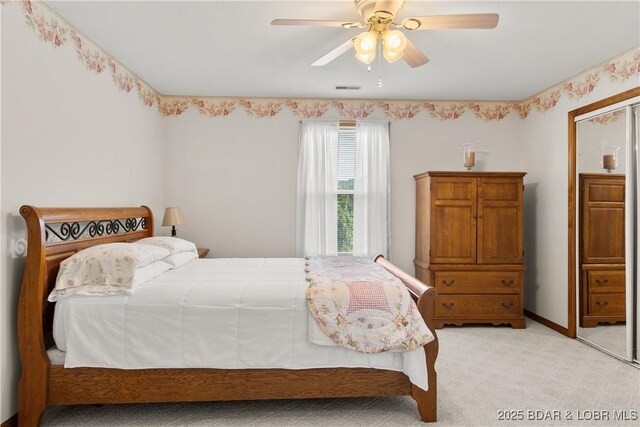 2326 Willow Creek Rd, Camdenton, MO 65020 - bedroom with light colored carpet and a ceiling fan