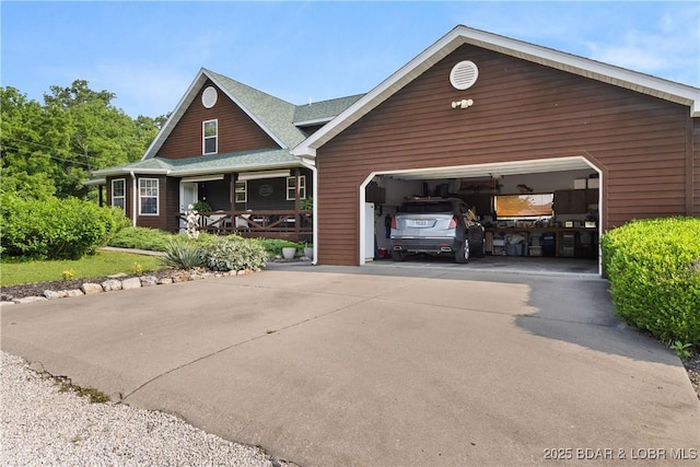 2326 Willow Creek Rd, Camdenton, MO 65020 - view of front of property with covered porch and an attached garage