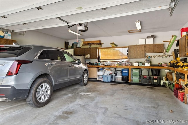 2326 Willow Creek Rd, Camdenton, MO 65020 - garage featuring a garage door opener