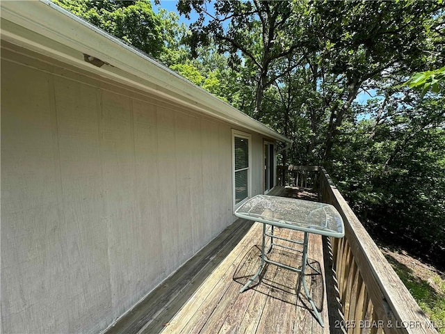 20 Barba Le Ln, Lake Ozark, MO 65049 - wooden terrace featuring view of scattered trees