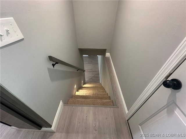 20 Barba Le Ln, Lake Ozark, MO 65049 - staircase with wood finished floors and baseboards