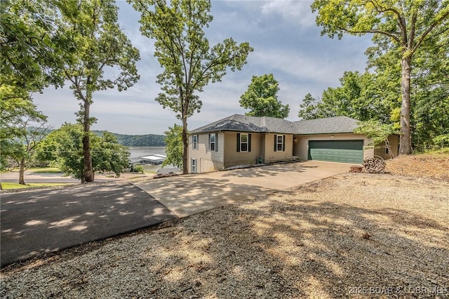 1508 Purvis Rd, Sunrise Beach, MO 65079 - single story home with driveway and a garage