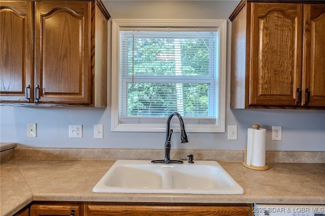 1508 Purvis Rd, Sunrise Beach, MO 65079 - kitchen featuring light countertops, plenty of natural light, and dishwasher