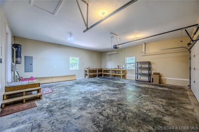 1508 Purvis Rd, Sunrise Beach, MO 65079 - garage with electric panel and a garage door opener