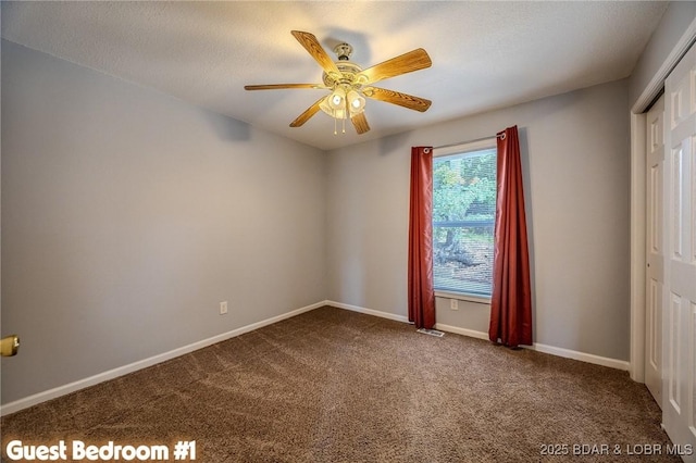 1508 Purvis Rd, Sunrise Beach, MO 65079 - carpeted empty room with a ceiling fan and baseboards