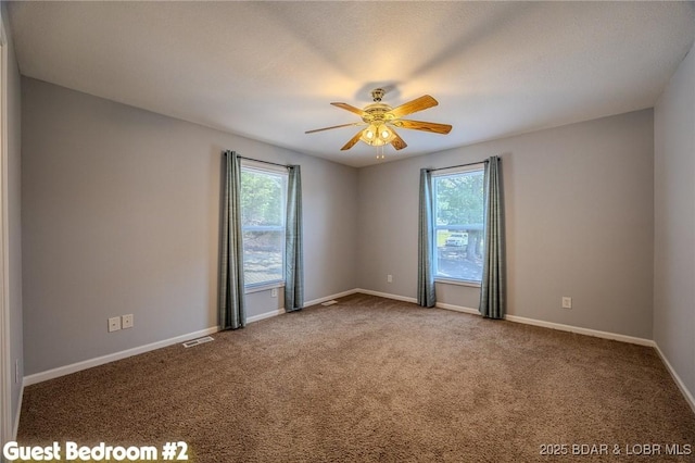1508 Purvis Rd, Sunrise Beach, MO 65079 - spare room featuring ceiling fan and carpet flooring