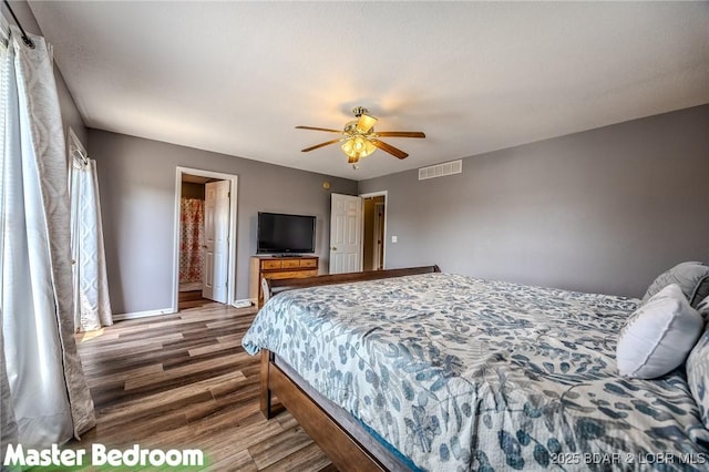 1508 Purvis Rd, Sunrise Beach, MO 65079 - bedroom with wood finished floors and a ceiling fan