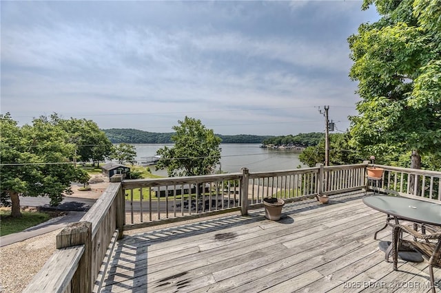 1508 Purvis Rd, Sunrise Beach, MO 65079 - wooden deck with a water view