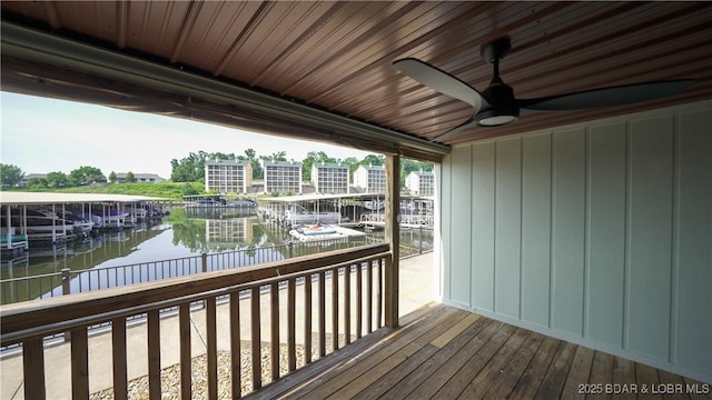 150 Southwood Shores Dr Unit 71-1B, Lake Ozark, MO 65049 - deck with a water view and a ceiling fan