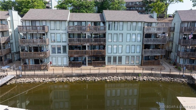 150 Southwood Shores Dr Unit 71-1B, Lake Ozark, MO 65049 - view of apartment building / complex featuring a water view