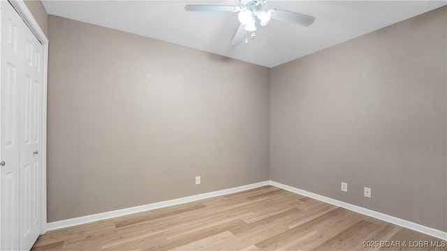 150 Southwood Shores Dr Unit 71-1B, Lake Ozark, MO 65049 - empty room with light wood-style flooring and a ceiling fan