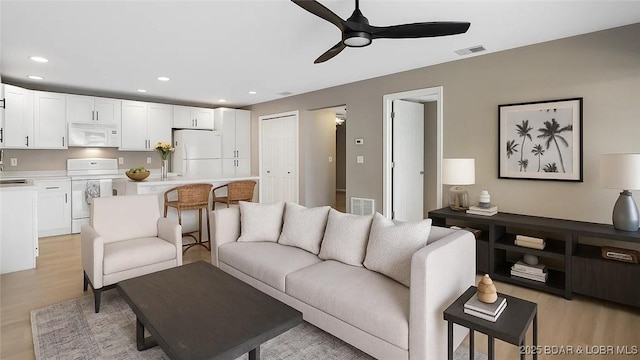 150 Southwood Shores Dr Unit 71-1B, Lake Ozark, MO 65049 - living room featuring a ceiling fan, light wood-style floors, and recessed lighting