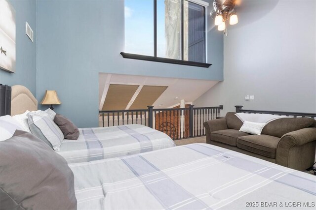 5940 Baydy Peak Rd Unit 1232, Osage Beach, MO 65065 - bedroom featuring a high ceiling and a ceiling fan