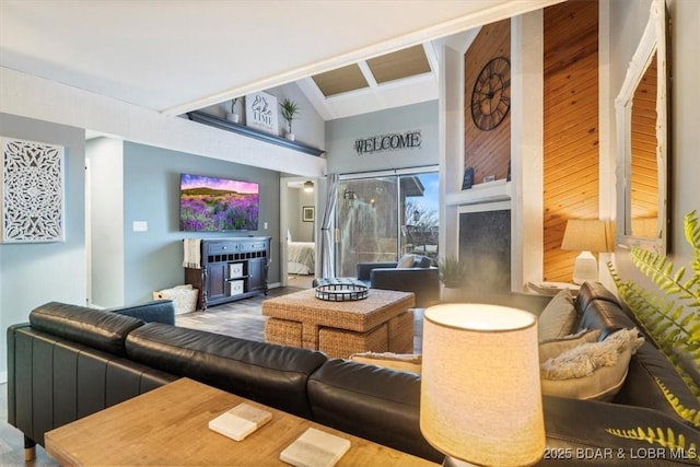 5940 Baydy Peak Rd Unit 1232, Osage Beach, MO 65065 - living room featuring high vaulted ceiling and beam ceiling