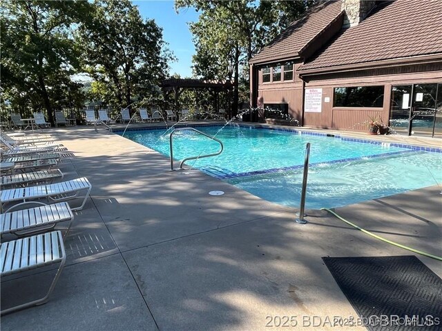 5940 Baydy Peak Rd Unit 1232, Osage Beach, MO 65065 - community pool featuring a patio