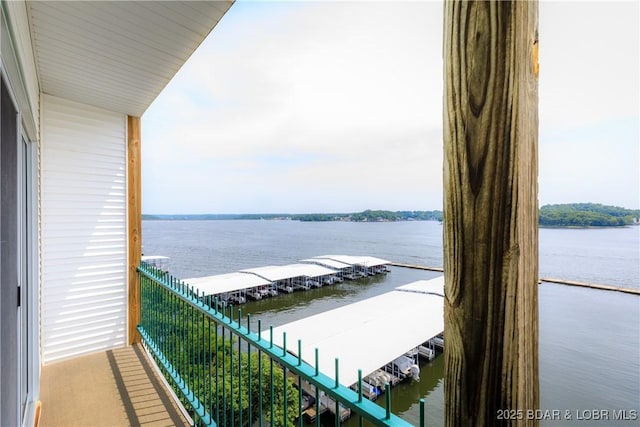 607 E Harbour Towne Dr Unit E-607, Lake Ozark, MO 65049 - balcony featuring a water view