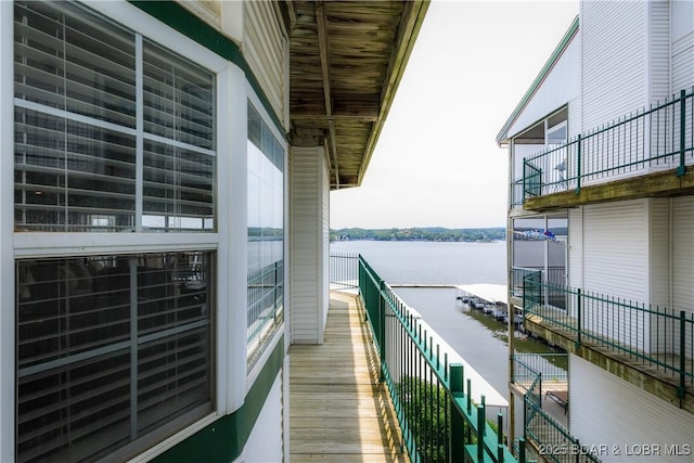 607 E Harbour Towne Dr Unit E-607, Lake Ozark, MO 65049 - balcony with a water view