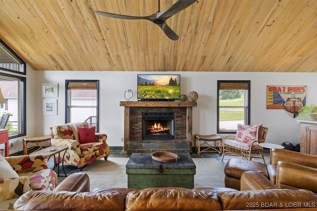 30594 Johnson Bay Rd, Gravois Mills, MO 65037 - carpeted living area with ceiling fan, a fireplace, healthy amount of natural light, lofted ceiling, and wood ceiling