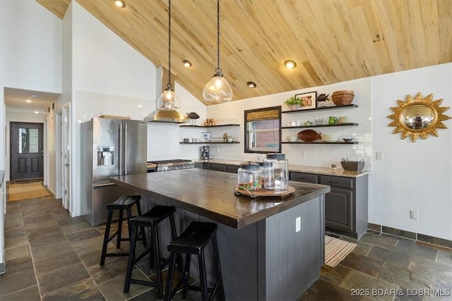 30594 Johnson Bay Rd, Gravois Mills, MO 65037 - kitchen featuring stainless steel refrigerator with ice dispenser, open shelves, wooden counters, tasteful backsplash, and hanging light fixtures
