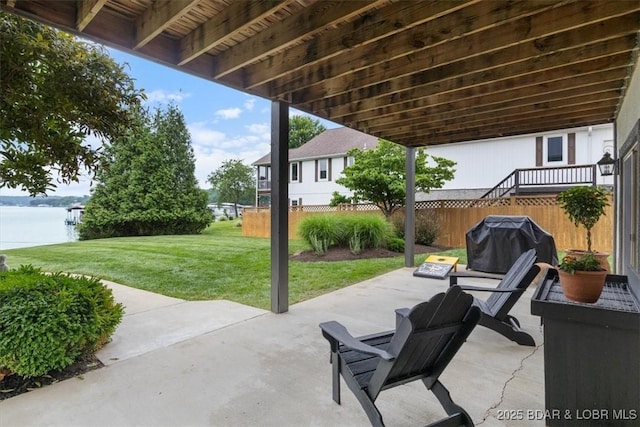 30594 Johnson Bay Rd, Gravois Mills, MO 65037 - view of patio with area for grilling and a water view