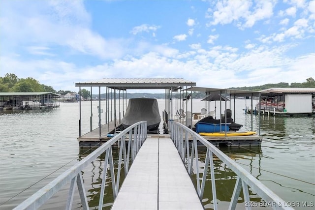 30594 Johnson Bay Rd, Gravois Mills, MO 65037 - dock area featuring a water view and boat lift