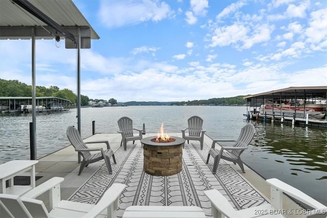 30594 Johnson Bay Rd, Gravois Mills, MO 65037 - dock featuring a fire pit and a water view
