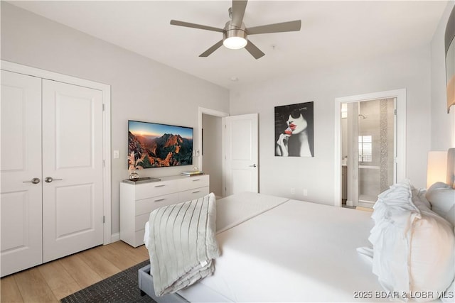166 Captiva Dr Unit 5D, Sunrise Beach, MO 65079 - bedroom with light wood finished floors, connected bathroom, and a ceiling fan
