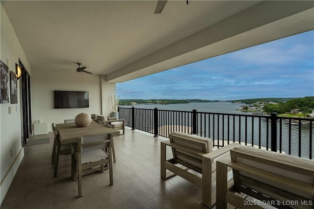 166 Captiva Dr Unit 5D, Sunrise Beach, MO 65079 - balcony featuring a ceiling fan and outdoor dining space