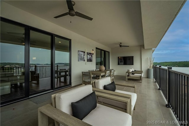 166 Captiva Dr Unit 5D, Sunrise Beach, MO 65079 - balcony with a ceiling fan and an outdoor living space