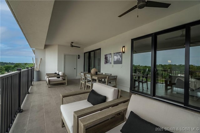 166 Captiva Dr Unit 5D, Sunrise Beach, MO 65079 - balcony with a ceiling fan