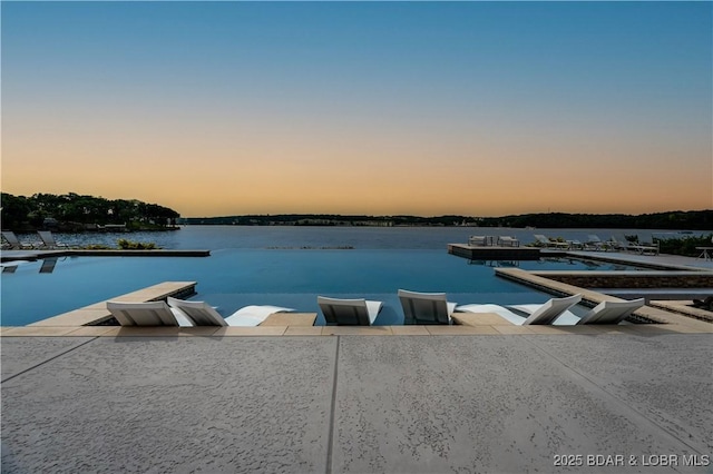 166 Captiva Dr Unit 5D, Sunrise Beach, MO 65079 - dock featuring a water view